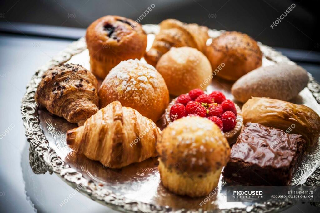 focused 154244478 stock photo cakes and pastries on silver 1